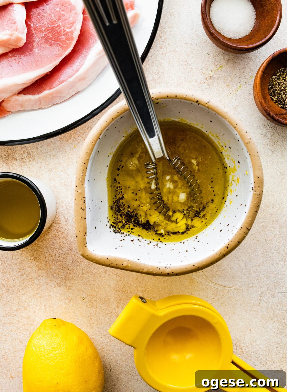 Perfectly Pan-Seared Thin Pork Chops: Quick Juicy Recipe 7 How to Make Best Juicy Thin Pork Chops Step by Step: mixing marinade ingredients in a bowl.