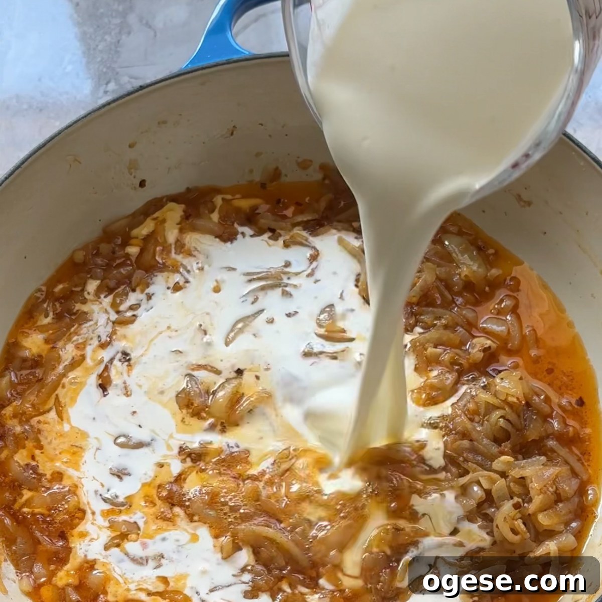 Caramelized Onion Pasta Recipe with Garlic and Parmesan 5 add heavy cream to make the sauce
