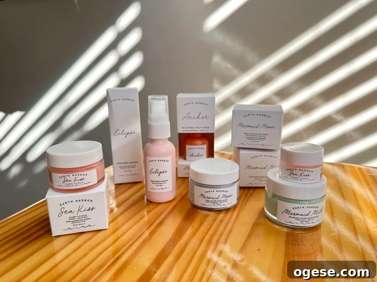 Earth Harbor Skincare Review: Real Pros, Cons, and Results 2 Earth Harbor skincare products including Sea Kiss lip scrub, Eclipse mist, Anchor serum, and Mermaid Milk cream displayed on wooden surface with natural light