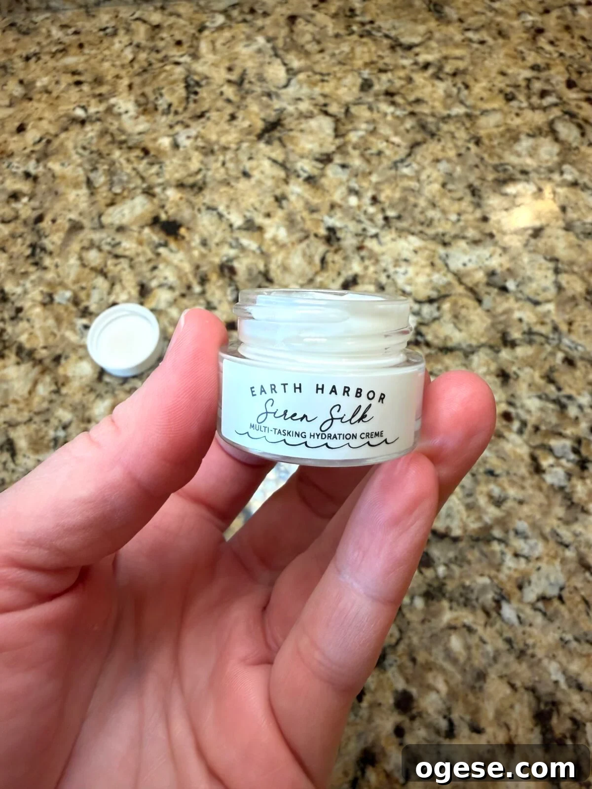 Earth Harbor Skincare Review: Real Pros, Cons, and Results 10 Open glass jar of Earth Harbor "Siren Silk" Multi-Tasking Hydration Creme showing white cream