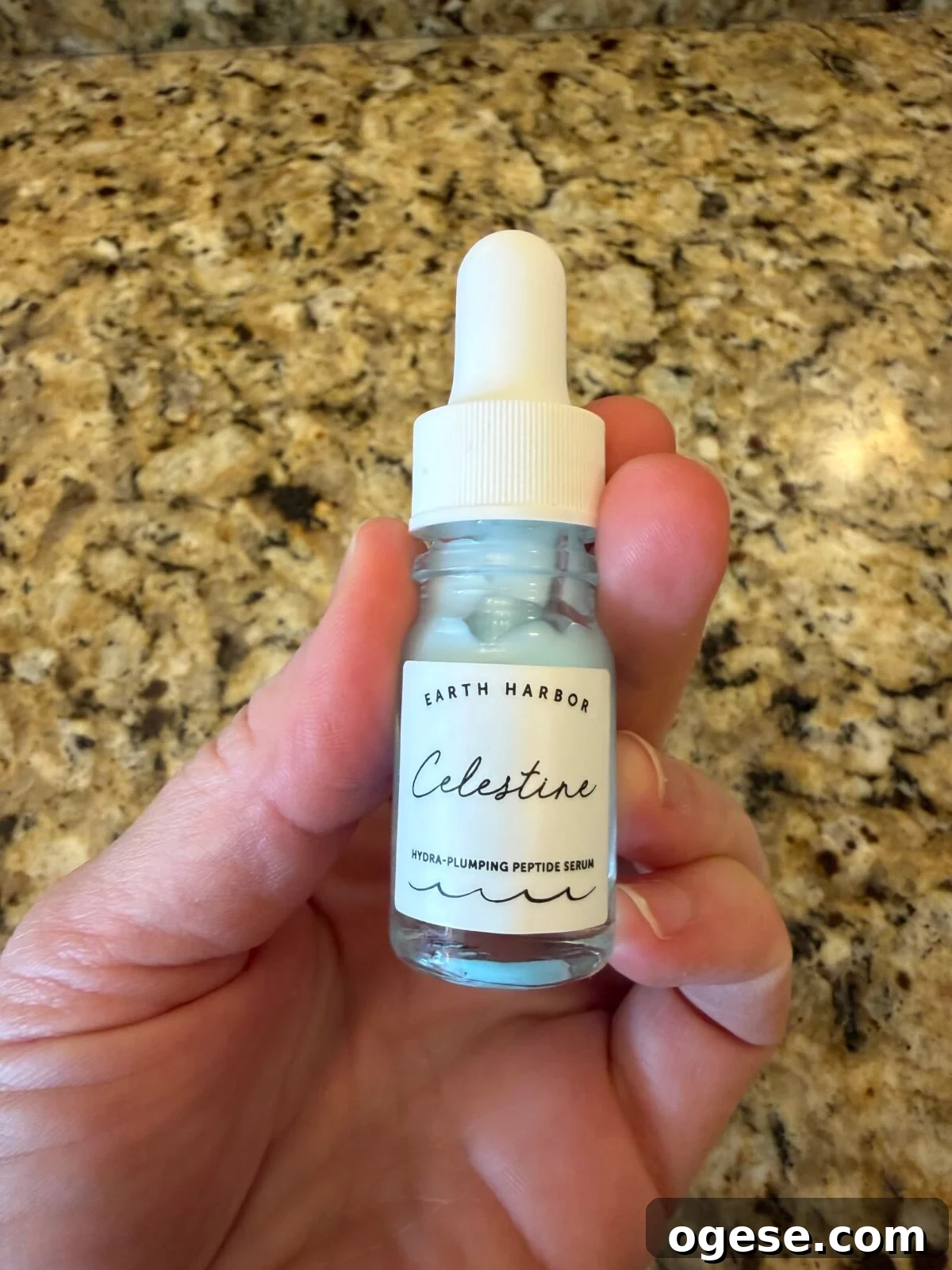 Earth Harbor Skincare Review: Real Pros, Cons, and Results 6 Glass dropper bottle of Earth Harbor "Celestine" Hydra-Plumping Peptide Serum with light blue liquid