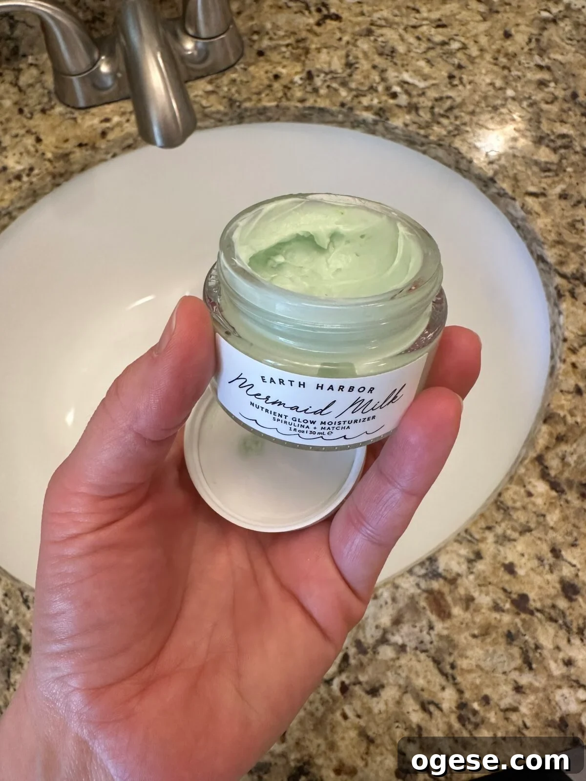 Earth Harbor Skincare Review: Real Pros, Cons, and Results 9 Open jar revealing the pale green cream inside