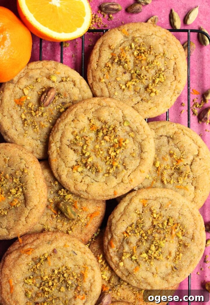 chewy orange cardamom pistachio sugar cookies on cooling rack