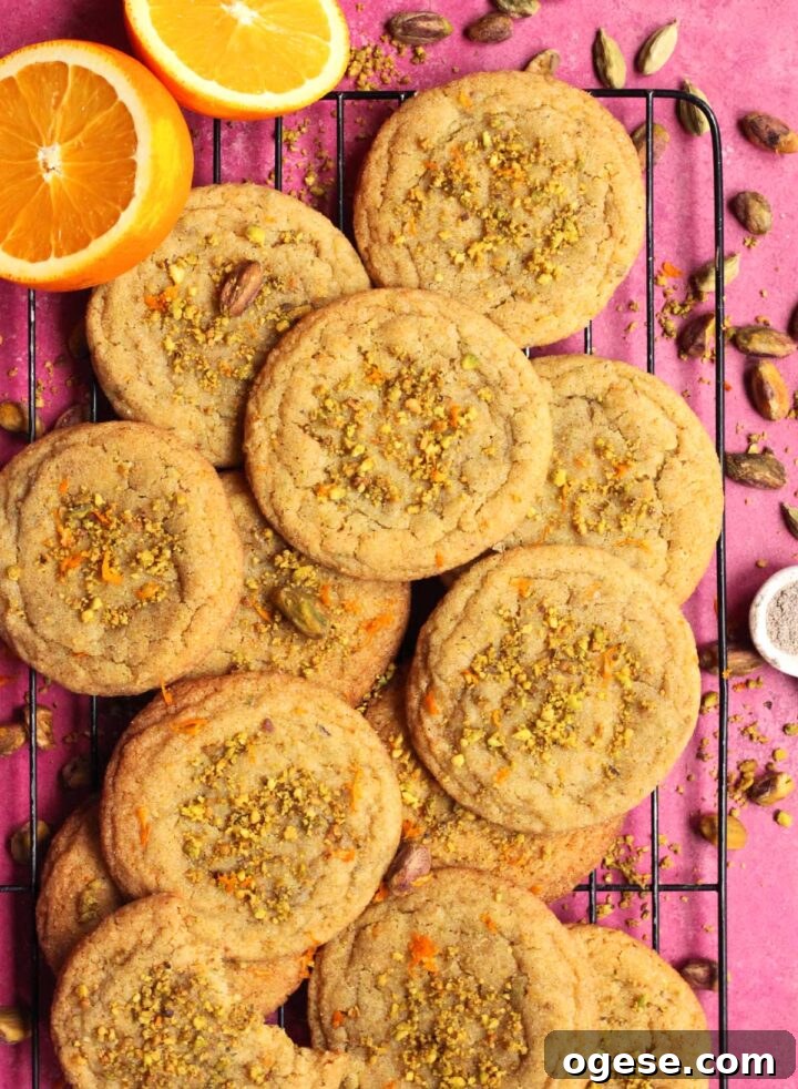 chewy orange cardamom pistachio sugar cookies on cooling rack