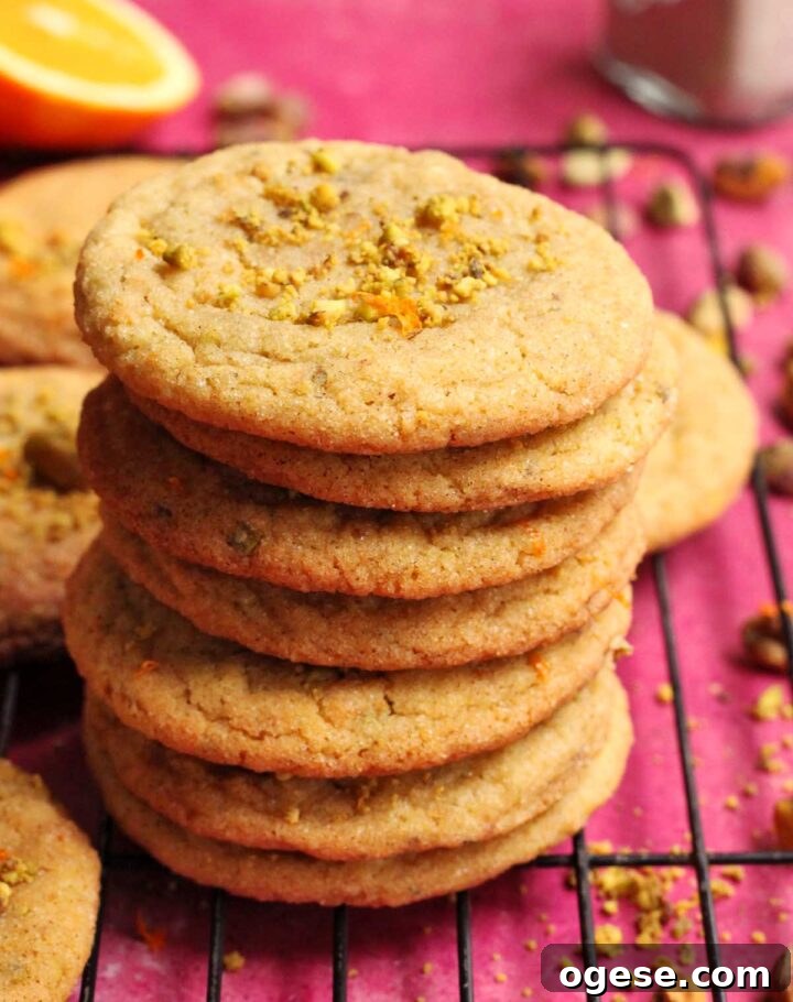 chewy orange cardamom pistachio sugar cookies on cooling rack