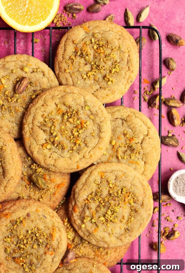 chewy orange cardamom pistachio sugar cookies on cooling rack