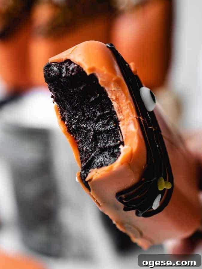 Spooky Halloween Cakesicles: Fun No-Bake Party Treats 5 Stack of Halloween cakesicles