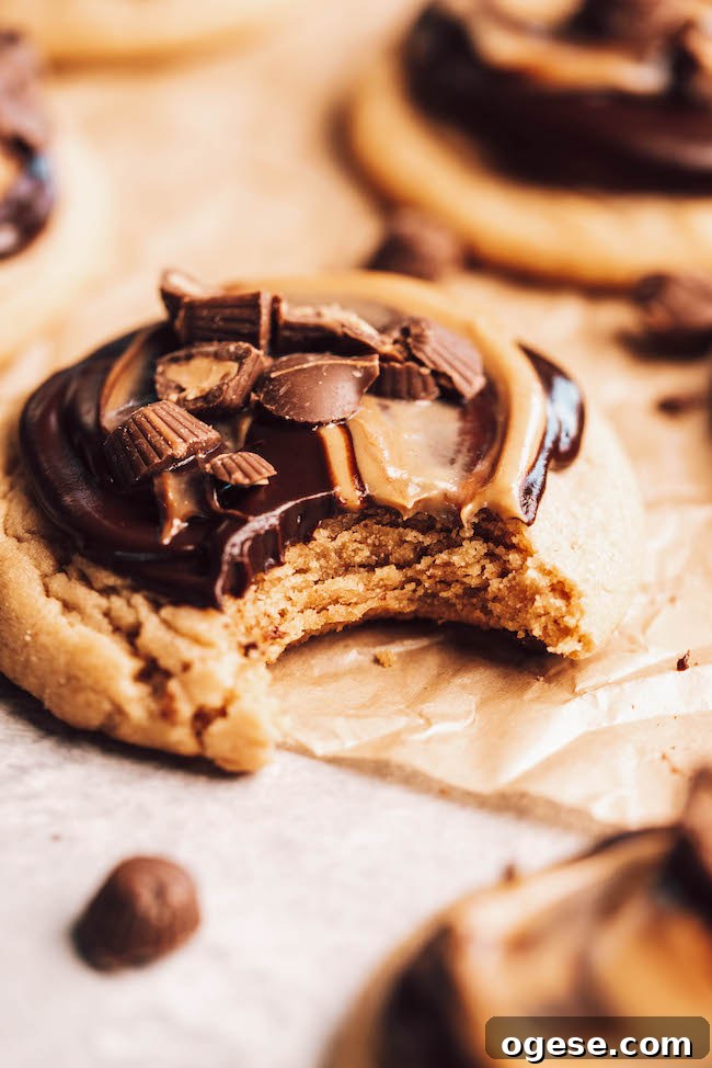 Peanut Butter Cup Chocolate Chip Cookies 3 bite shot of peanut butter cup cookies