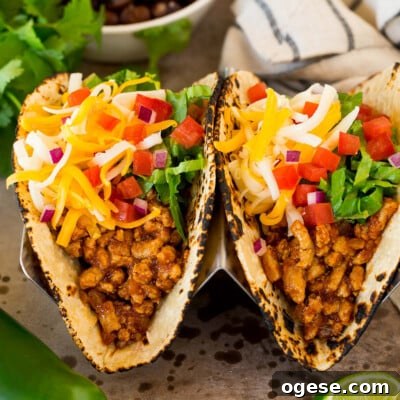 Ground turkey tacos with assorted toppings.