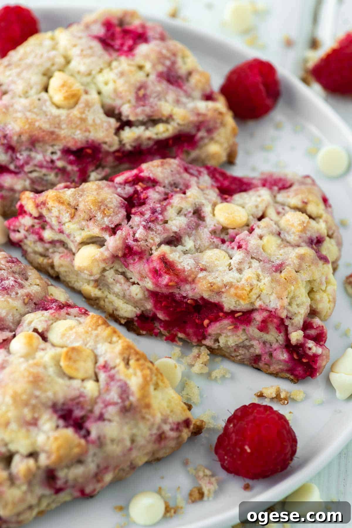 Raspberry White Chocolate Scones Recipe for Perfect Tea-Time Baking 2 close-up of raspberry and white chocolate scones on plate