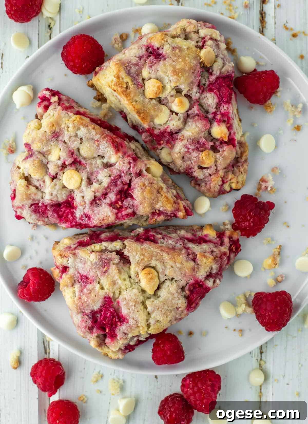 Raspberry White Chocolate Scones Recipe for Perfect Tea-Time Baking 8 overhead shot of raspberry and white chocolate scones on plate