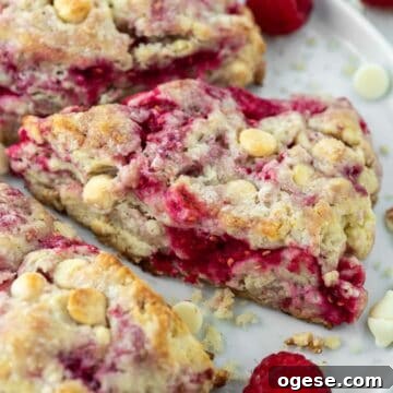Raspberry White Chocolate Scones Recipe for Perfect Tea-Time Baking 9 close-up of raspberry and white chocolate scones on plate