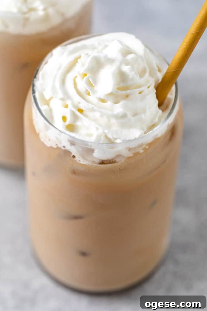 Iced Blonde Vanilla Latte Recipe: Creamy Cold Coffee Guide 2 Close up view of an iced blonde vanilla latte in a glass.