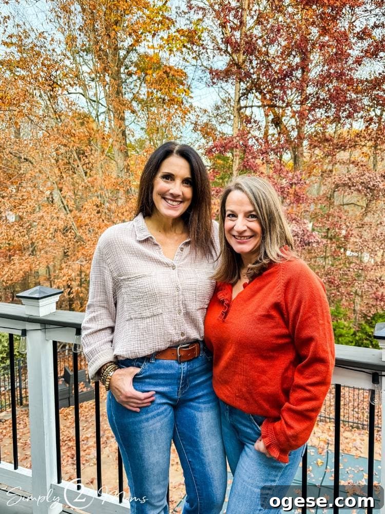 bloggers standing outside on deck with trees behind them