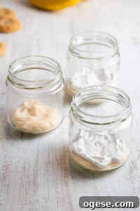 Custard and whipped cream in a jar.