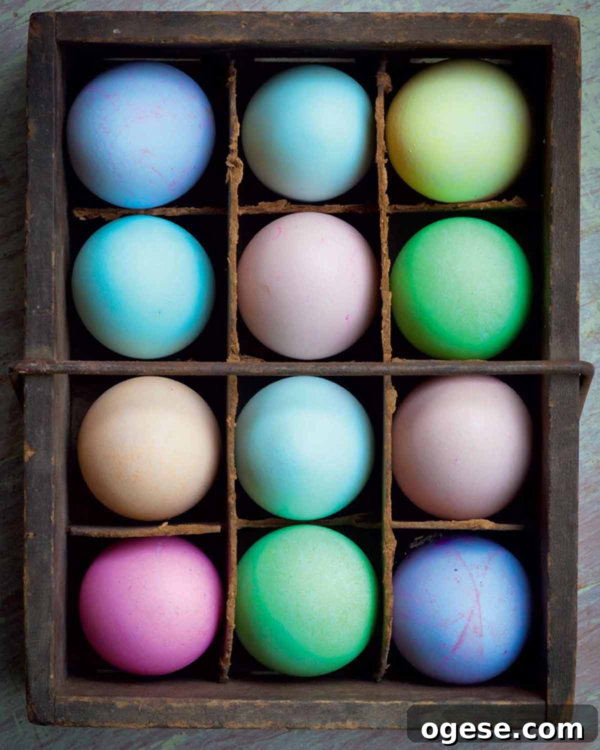 How to Cook and Use Eggs: Practical Tips and Techniques 9 A crate filled with an assortment of dyed easter eggs.