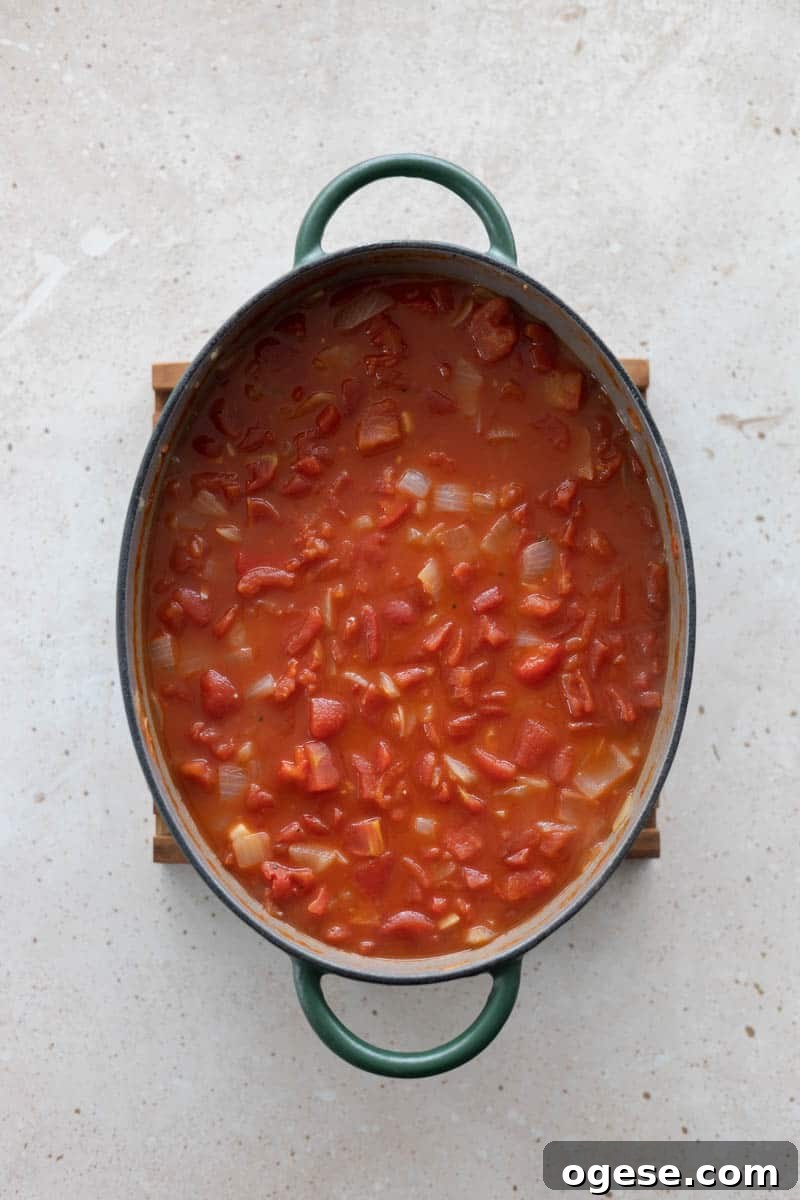 Roasted Red Pepper and Tomato Soup Recipe for Cozy Weeknights 8 Tomatoes added to the soup.