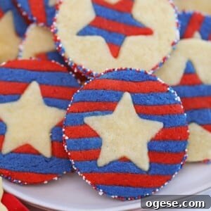 Close-up of red, white, and blue striped sugar cookie with a star embedded in the middle.