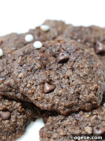 Double chocolate chip banana cookies on a white plate.