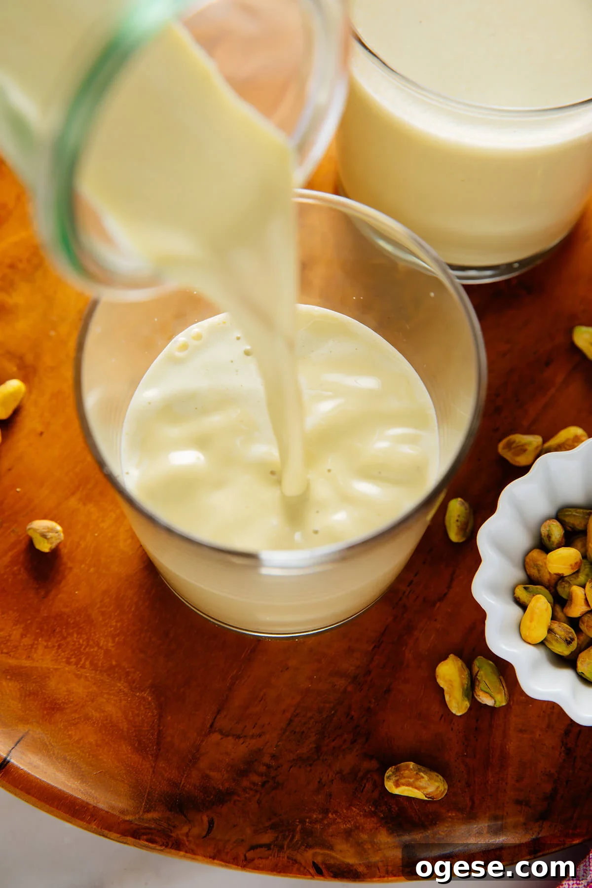 pouring pistachio milk