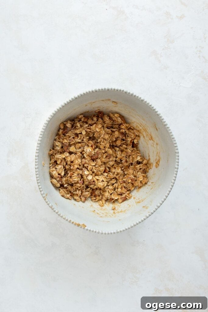 dairy-free and gluten-free oat crumble topping in a mixing bowl