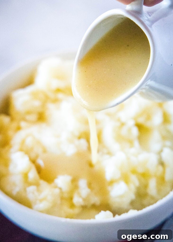 Classic Homemade Gravy Recipe for Perfect Comfort Meals 4 pouring gravy over mashed potatoes