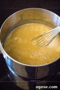 Classic Homemade Gravy Recipe for Perfect Comfort Meals 9 gravy simmering in a saucepan