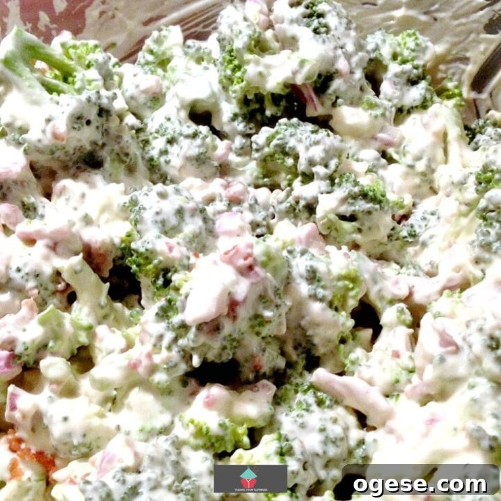 Bacon and Broccoli Salad, an easy recipe using fresh broccoli, crispy bacon and cheese, all combined in a creamy garlic dressing. Ideal as a main or side dish.