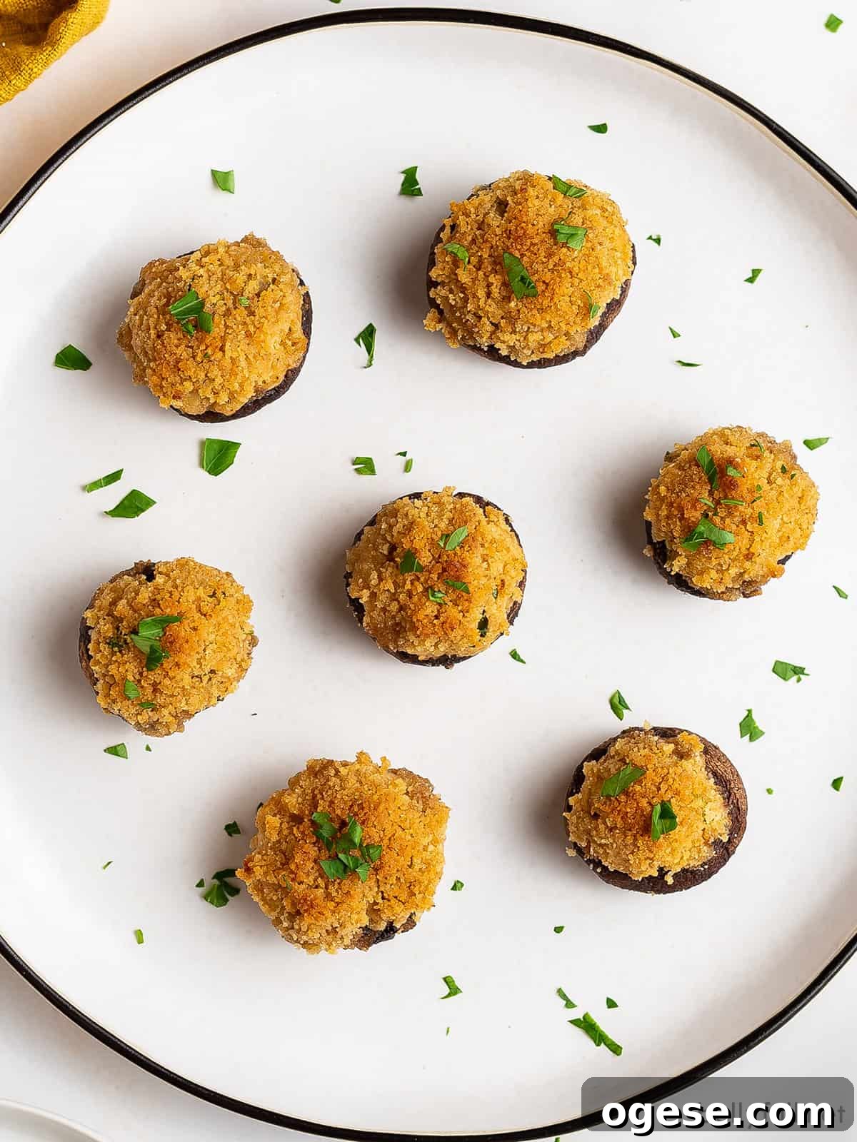 Overhead view of crab stuffed mushrooms with cream cheese