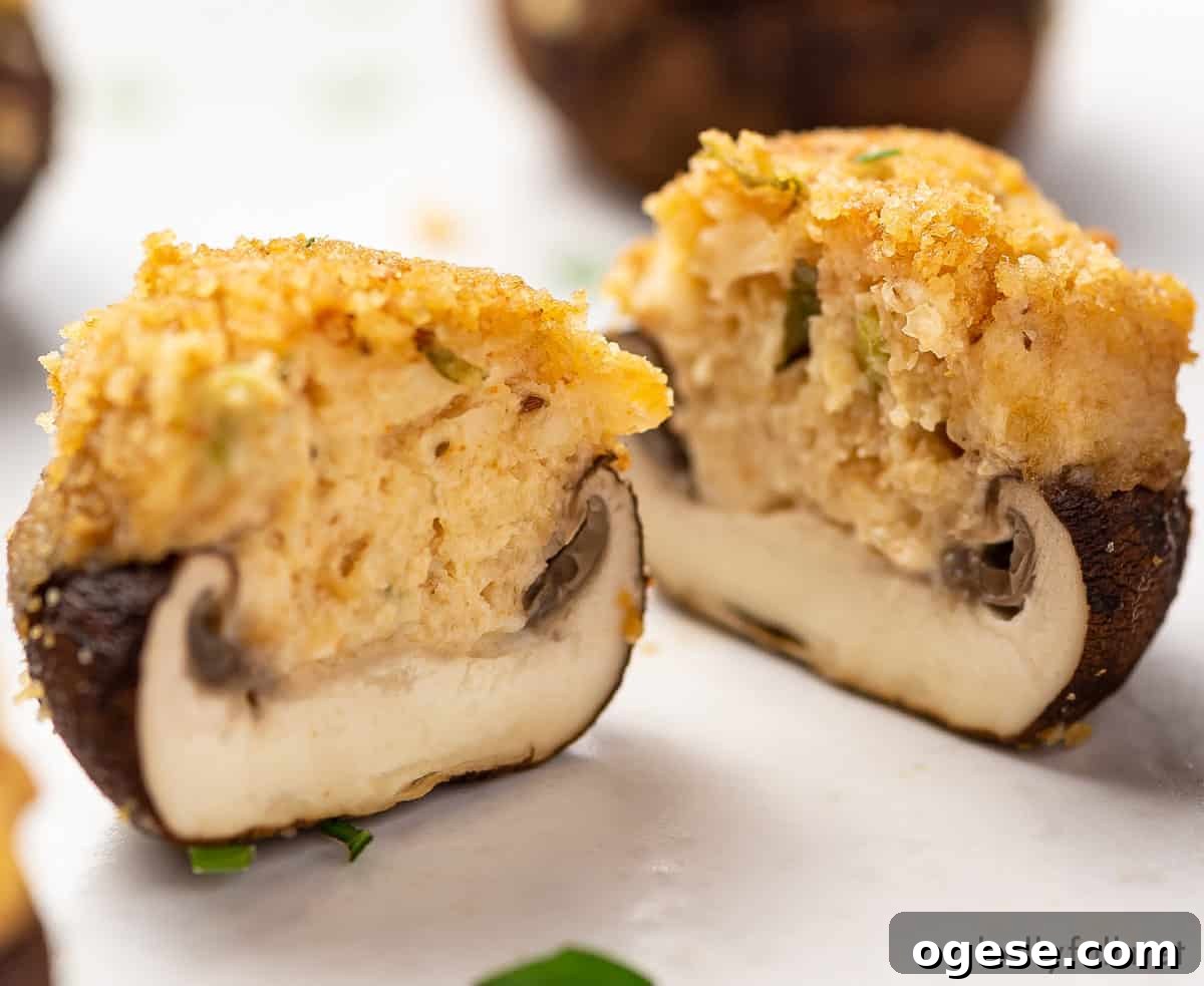 A crab stuffed mushroom cut in half