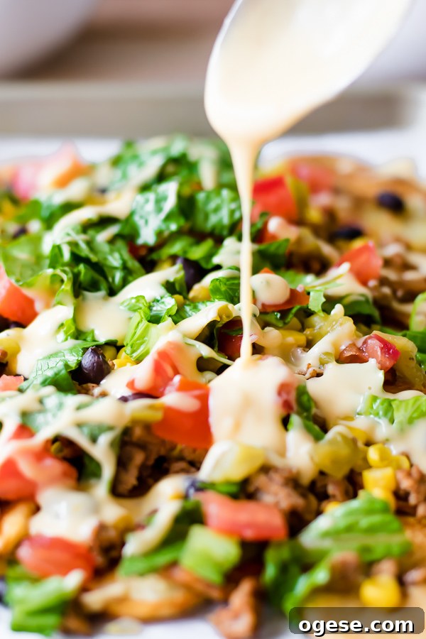 Ultimate Loaded Sheet Pan Nachos Recipe for Game Night 3 loaded sheet pan nachos