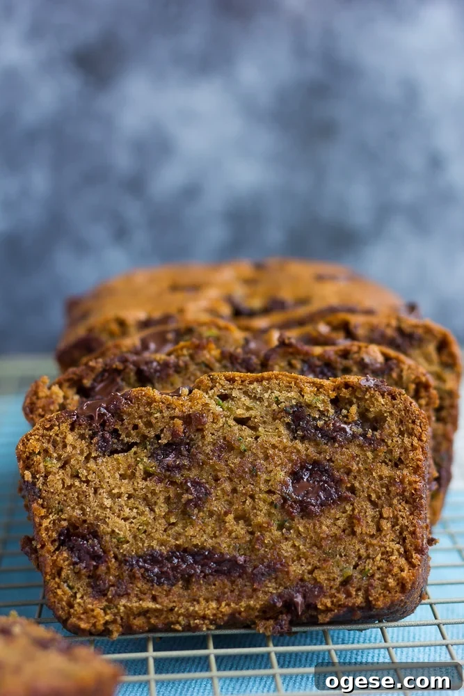 close up of vegan zucchini bread with black and white background.
