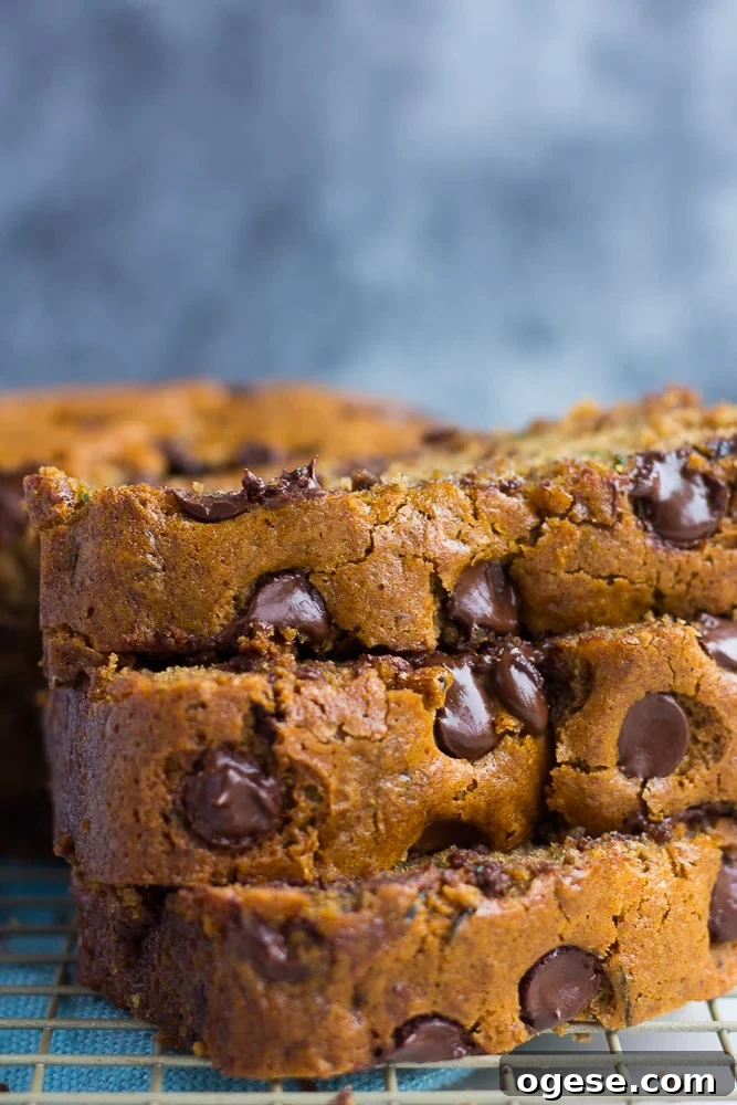 close up side photo of vegan zucchini bread with chocolate chips.