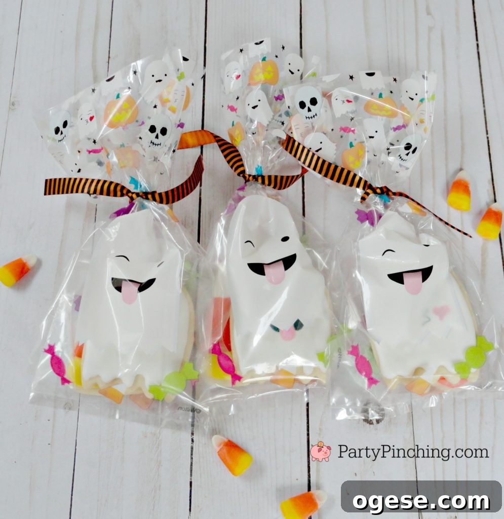 too cute to spook cookies, halloween cookies for kids, cute halloween cookies, ghost candy corn cookies, halloween party ideas