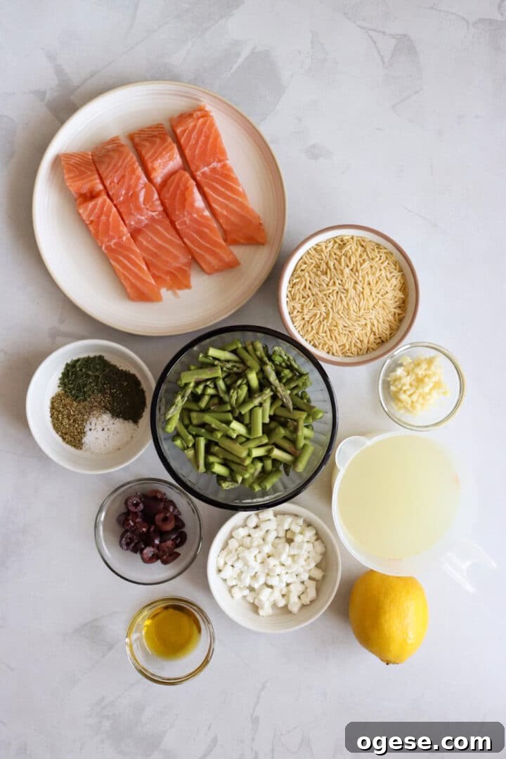 One-Pan Lemon Salmon and Orzo Recipe 4 Ingredients for salmon orzo recipe displayed in small bowls on a white kitchen counter