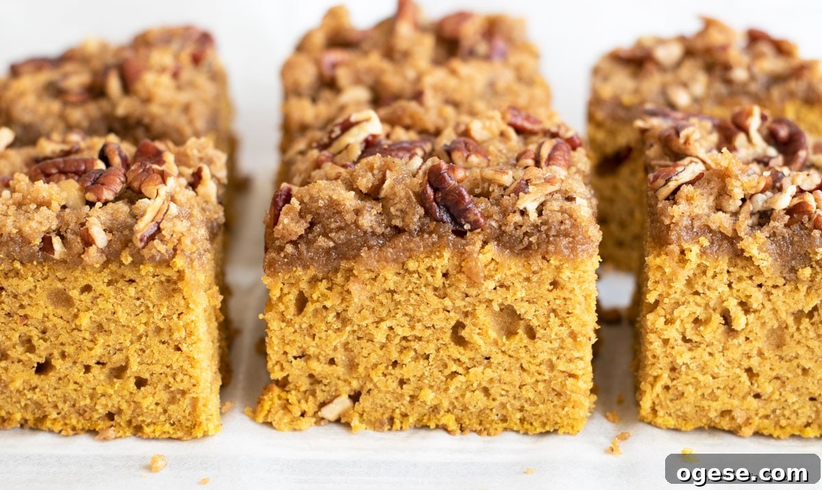 Slices of pumpkin coffee cake in rows.