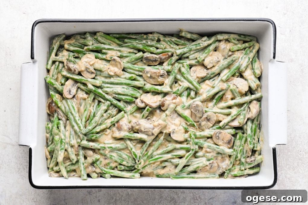 Dairy-Free Cashew Cream Green Bean Casserole (Gluten-Free) 13 Green beans tossed with creamy mushroom sauce in a 9x13 baking dish.