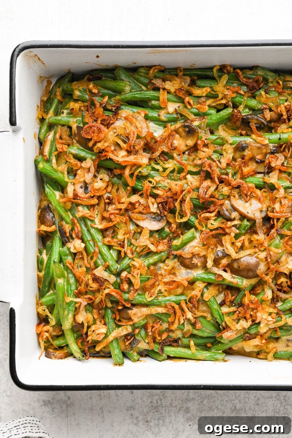 Dairy-Free Cashew Cream Green Bean Casserole (Gluten-Free) 3 Baked gluten free green bean casserole topped with crispy shallots.