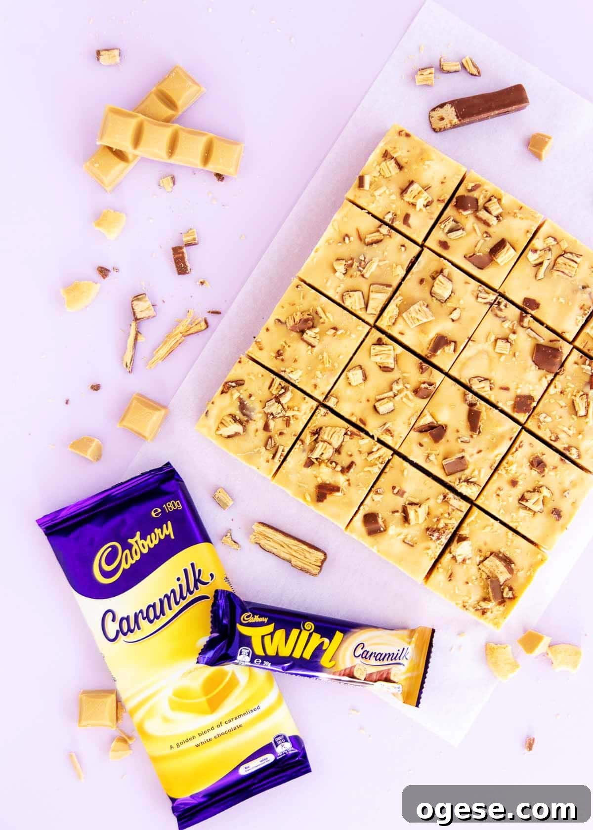 16 squares of slice, with a wrapped block of Caramilk chocolate and a Caramilk Twirl. 