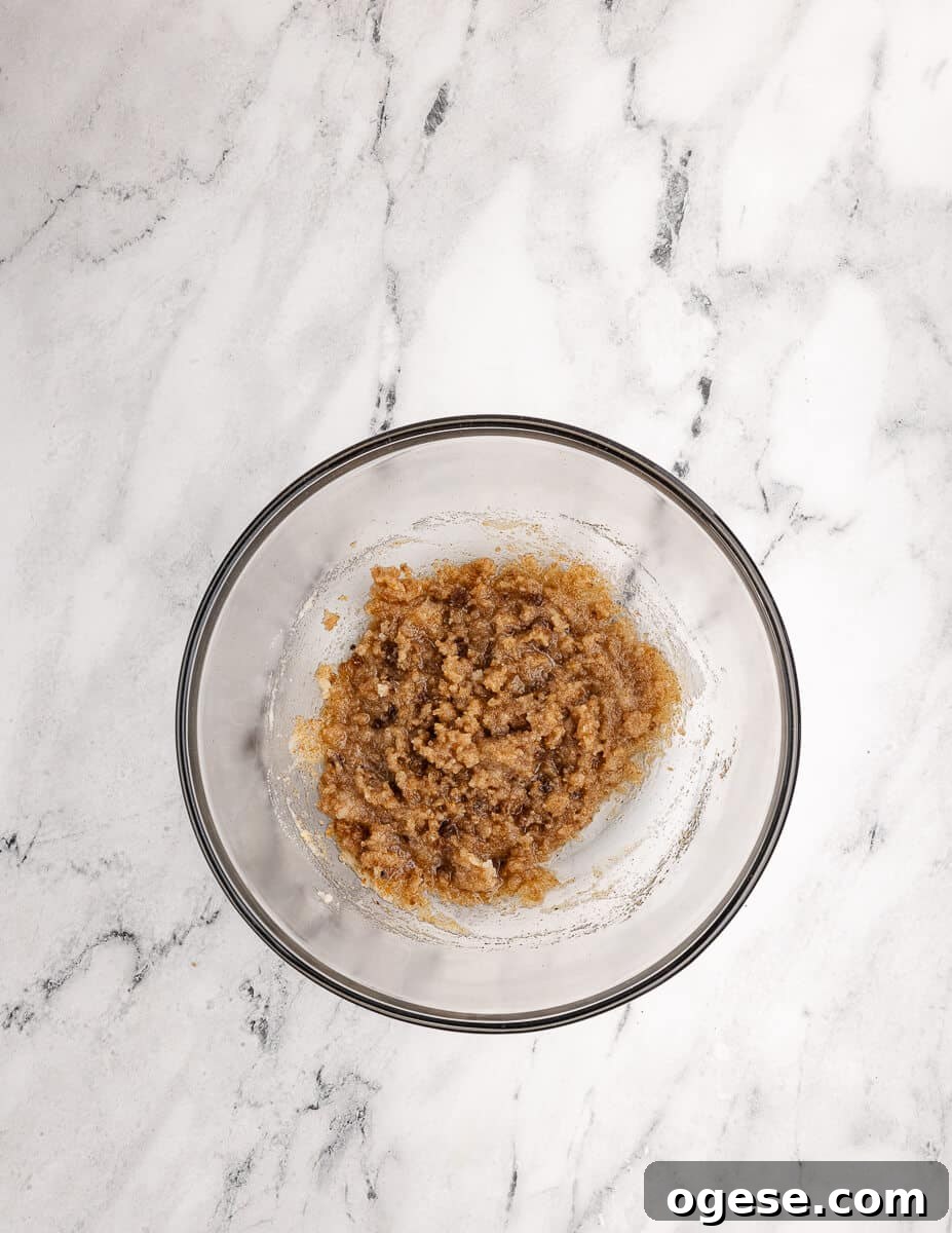 Gluten-Free Chocolate Chip Cookie Recipe You’ll Love 11 a bowl of mixed sugar and browned butter
