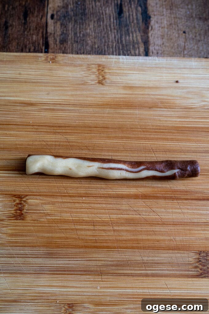 Greek Butter Koulourakia Cookies with Chocolate Swirl 20 Showing how to fold the koulourakia.