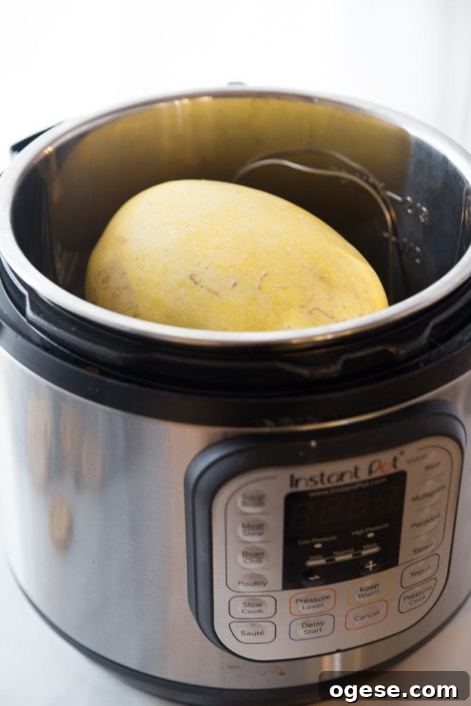How to Prepare Spaghetti Squash: Simple Steps + Tasty Recipes 3 Photo of a whole spaghetti squash in an Instant Pot
