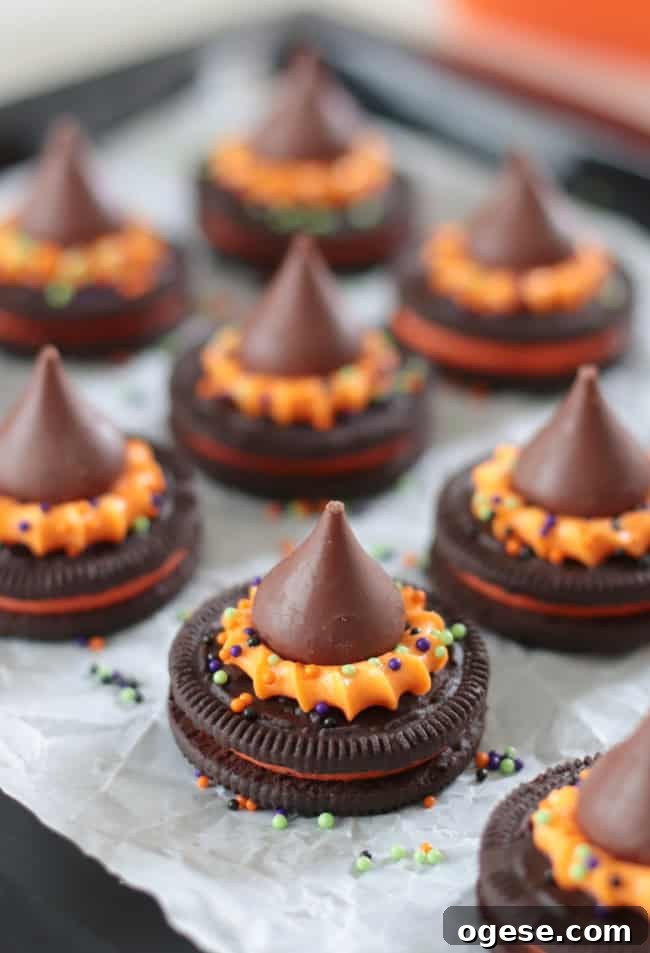oreo witch hat cookies on parchment paper