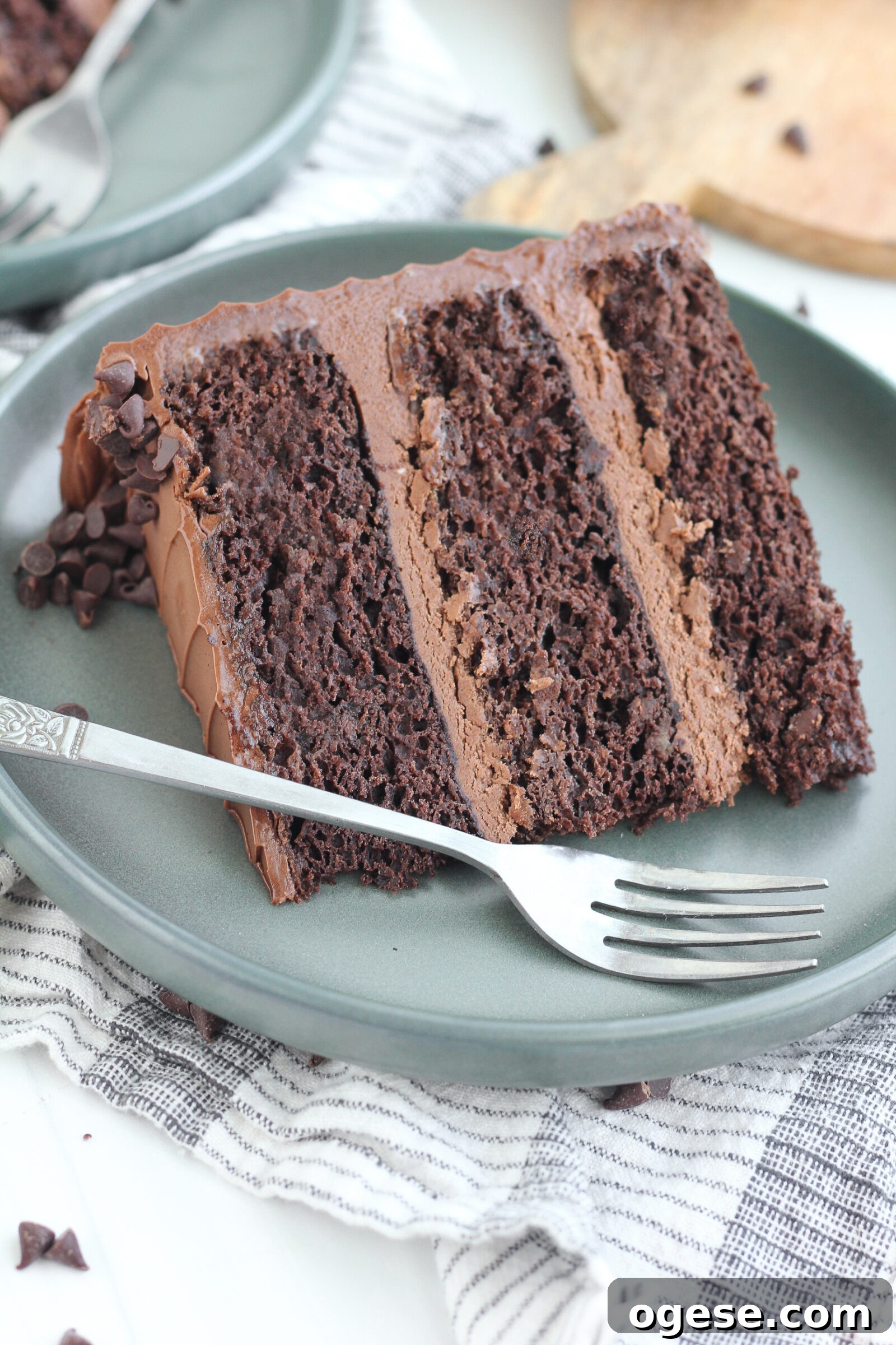 Decadent Chocolate Banana Cake Recipe for Moist, Rich Flavor 11 Frosting the cake
