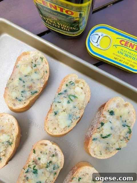 Overhead shot of garlic bread on a baking sheet.