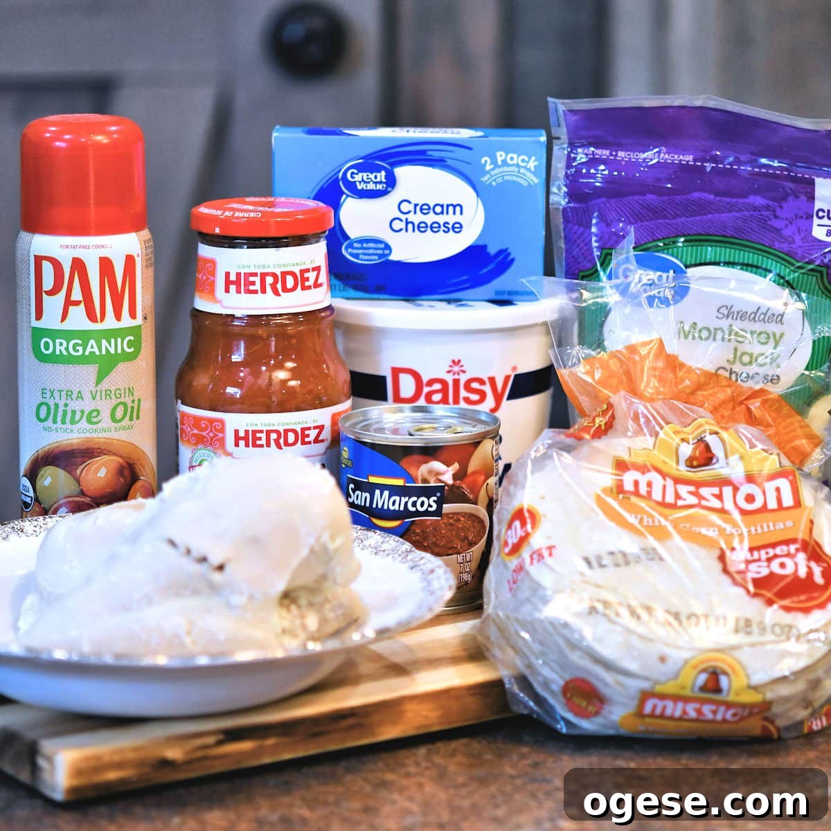 Salsa Chicken Enchiladas with Cheesy Tomato Sauce Recipe 3 ingredients for salsa chicken enchilada on a countertop