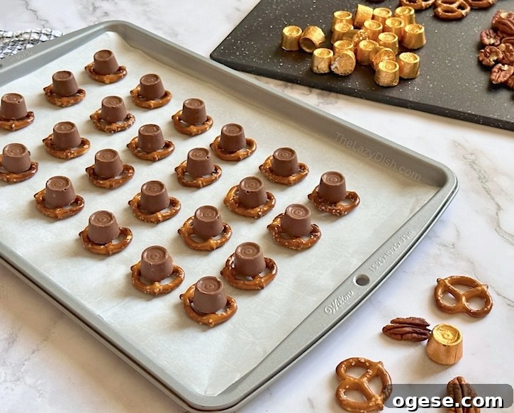 Rolo Pretzel Bites: Chocolate-Caramel Snack Recipe 5 Unwrap, bake, squish, and enjoy. That's how simple it is to make these delicious pretzel rolo bites. make a homemade sweet treat in just 5 minutes.