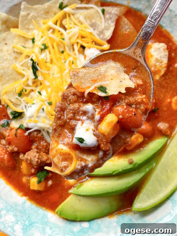a spoonful of slow cooker beef taco soup