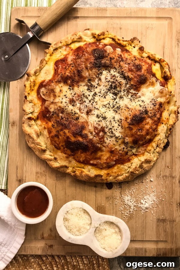 Double-Crust Stuffed Pizza: Ultimate Guide to Making It at Home 2 whole stuffed pizza on cutting board