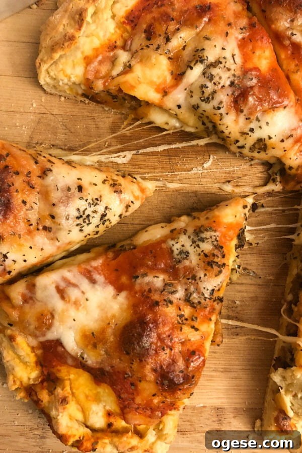 Double-Crust Stuffed Pizza: Ultimate Guide to Making It at Home 4 3 slices of stuffed pizza with melting cheese